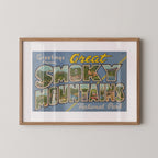 Vintage "Greetings from the Great Smoky Mountains" large letter postcard print, with oversized vintage-style block letters spelling THE GREAT SMOKY MOUNTAINS filled with nostalgic scenic snapshots, celebrating the Great Smoky Mountains as a beloved travel destination. Printed as a giclée fine art print on archival matte paper.