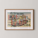 Vintage "Greetings from the Badlands" large letter postcard print, with oversized vintage-style block letters spelling THE BADLANDS filled with nostalgic scenic snapshots, celebrating the Badlands as a beloved travel destination. Printed as a giclée fine art print on archival matte paper.