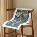 Vintage "Greetings from West Yellowstone" large letter postcard print, with oversized vintage-style block letters spelling WEST YELLOWSTONE filled with nostalgic scenic snapshots, celebrating West Yellowstone as a classic American city travel keepsake. Printed as a giclée fine art print on archival matte paper.