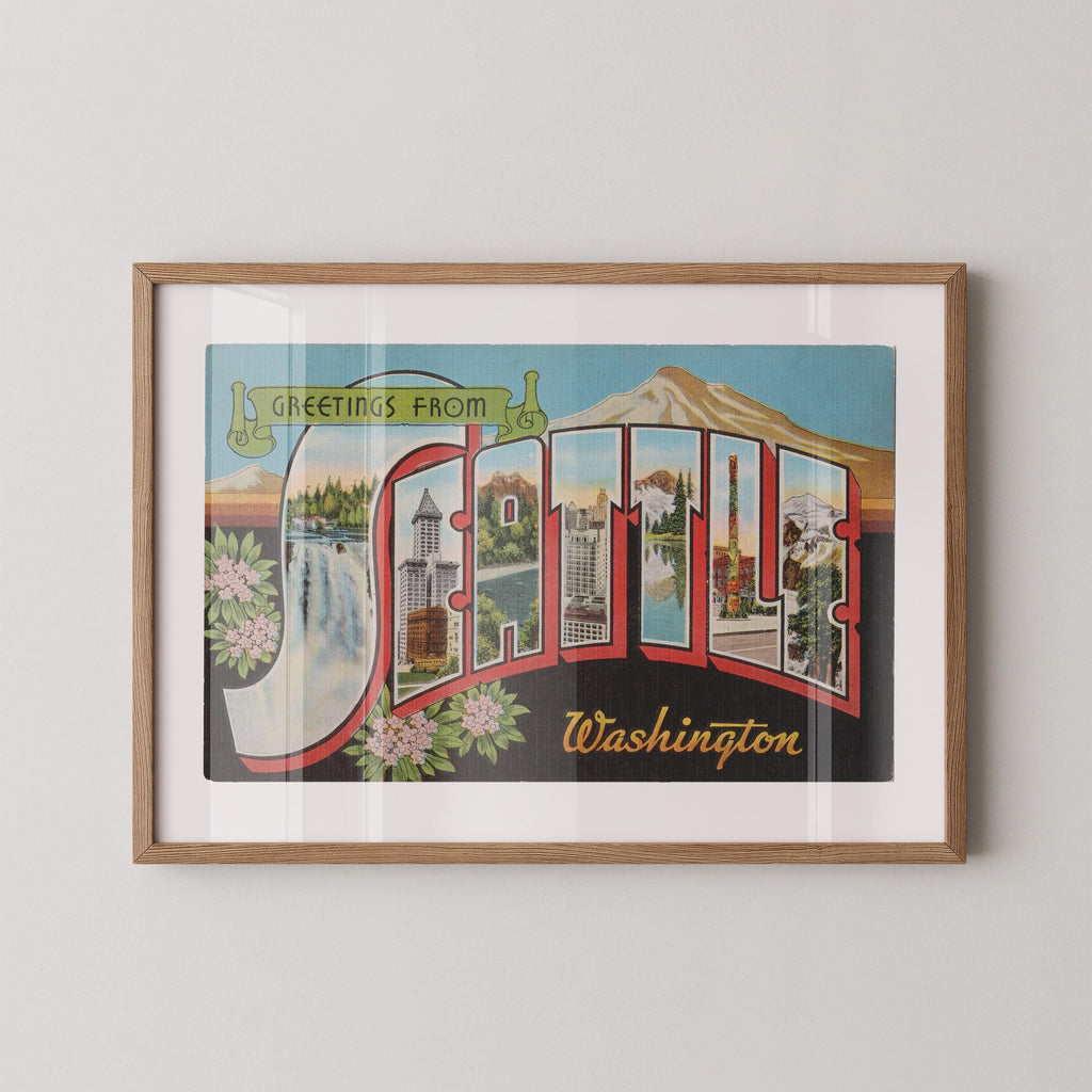 Vintage "Greetings from Seattle" large letter postcard print, with oversized vintage-style block letters spelling SEATTLE filled with nostalgic scenic snapshots, celebrating Seattle as a classic American city travel keepsake. Printed as a giclée fine art print on archival matte paper.
