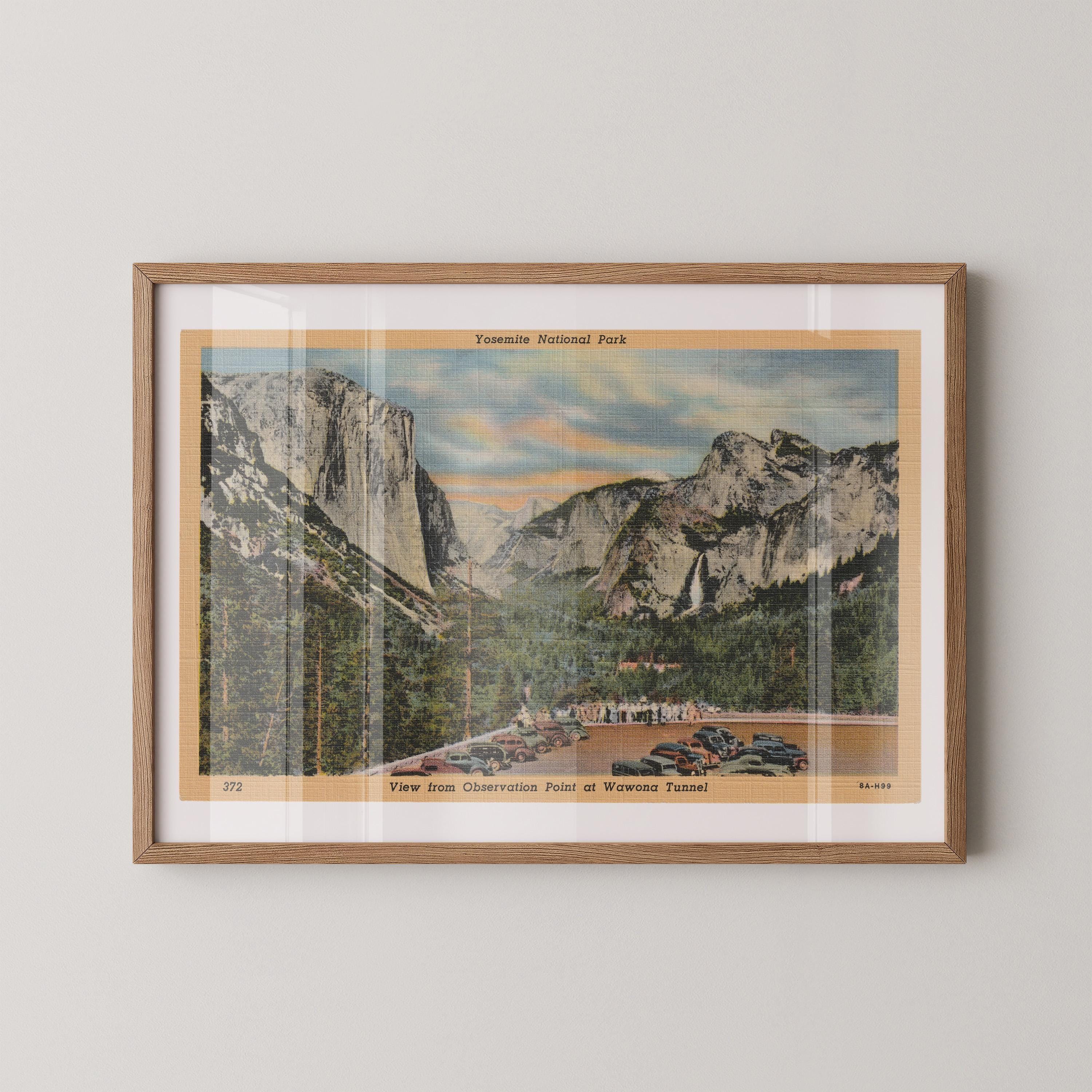 Vintage landscape postcard print of the iconic Wawona Tunnel overlook, framing Yosemite Valley, El Capitan, and Half Dome in the distance, Yosemite National Park. Printed as a giclée fine art print on archival matte paper.