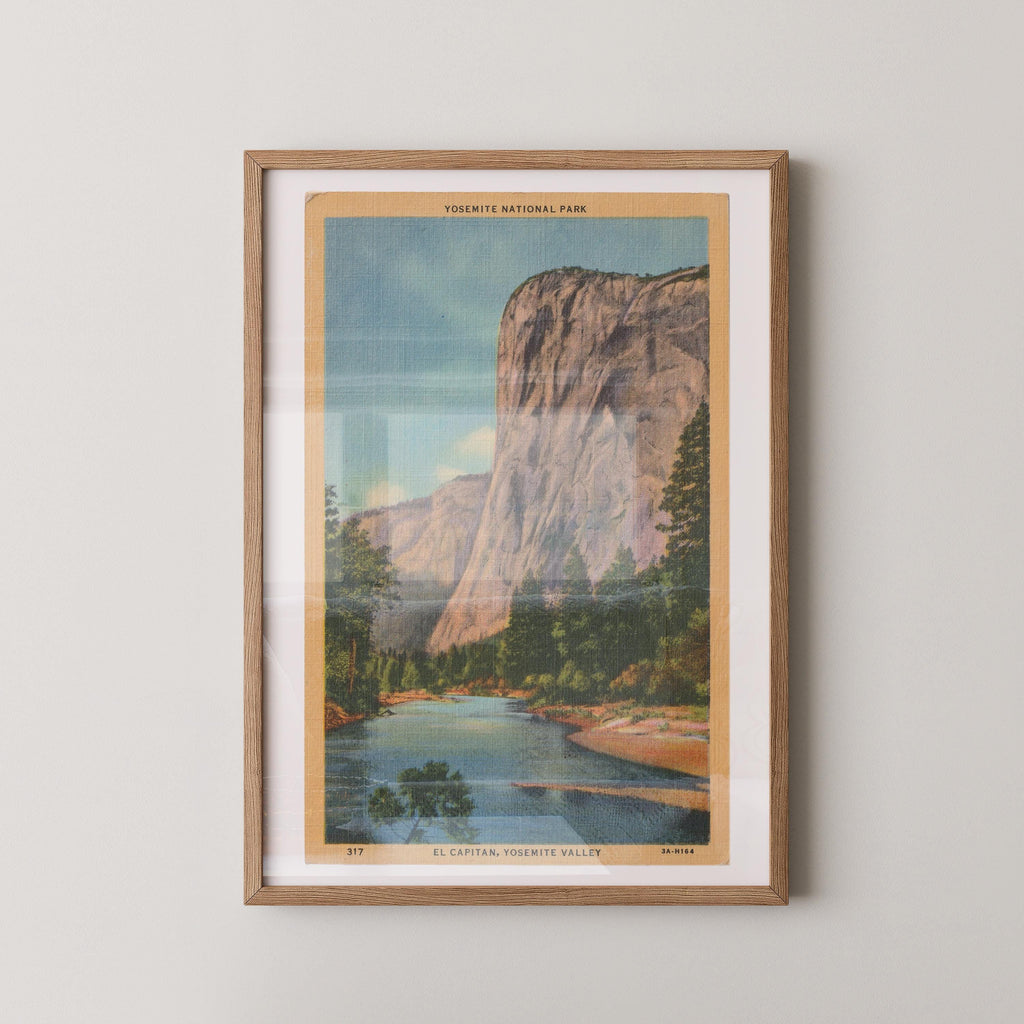 Vintage landscape postcard print of El Capitan's massive granite monolith rising above Yosemite Valley, Yosemite National Park. Printed as a giclée fine art print on archival matte paper.