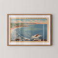 Vintage landscape postcard print of a sunny California beach with rolling waves along the coastline. Printed as a giclée fine art print on archival matte paper.