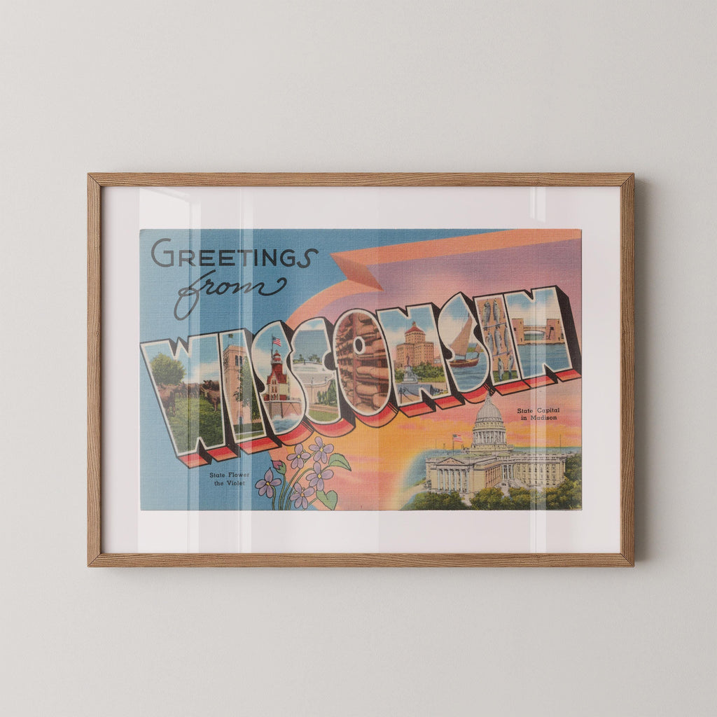 Vintage "Greetings from Wisconsin" large letter postcard print, with oversized vintage-style block letters spelling WISCONSIN filled with nostalgic scenic snapshots, celebrating Wisconsin as a U.S. state travel keepsake. Printed as a giclée fine art print on archival matte paper.