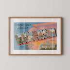 Vintage "Greetings from Wisconsin" large letter postcard print, with oversized vintage-style block letters spelling WISCONSIN filled with nostalgic scenic snapshots, celebrating Wisconsin as a U.S. state travel keepsake. Printed as a giclée fine art print on archival matte paper.