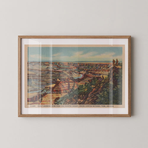 Vintage landscape postcard print of the Grand Canyon's layered rock formations glowing in soft early-morning light. Printed as a giclée fine art print on archival matte paper.